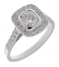 Classic cushion cut diamond rubover halo engagement ring