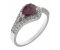 Deco curved pear shape ruby and round brilliant cut diamond halo ring