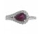 Deco curved pear shape ruby and round brilliant cut diamond halo ring
