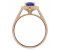 Classic claw set oval blue sapphire with round diamond halo ring