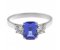 Rosaline emerald cut tanzanite and round diamond trilogy ring