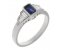 Art deco emerald cut blue sapphire and baguette diamond rubover ring
