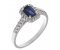 Prudence classic emerald cut blue sapphire and round brilliant diamond halo ring