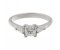 Classic princess cut diamond engagement ring with pear shape side stones