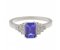 Deco step emerald cut tanzanite and round diamond ring