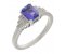 Deco step emerald cut tanzanite and round diamond ring