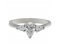 Classic pear shape diamond engagement ring with pear shape side stones
