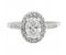 Classic claw set oval diamond with round diamond halo engagement ring