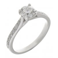 Kiss style round diamond solitaire engagement ring with grain set diamond shoulders