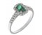 Prudence classic emerald cut emerald and round brilliant diamond halo ring