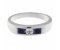 Classic channel set round brilliant cut diamond centre and blue sapphire trilogy ring top view