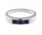Classic channel set round blue sapphire trilogy ring top