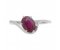 Modern oval ruby crossover solitaire ring top view