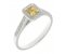 Classic claw set emerald cut yellow sapphire and round diamond halo cluster ring angle view