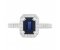 Classic claw set emerald cut blue sapphire and diamond halo cluster ring top view