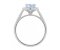 Classic claw set oval aquamarine with round diamond halo ring side view