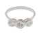 Classic rubover set round brilliant cut diamond trilogy ring angle view