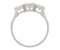 Classic rubover set round brilliant cut diamond trilogy ring side view