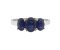 Classic oval blue sapphire trilogy ring