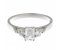 Olivia classic emerald cut and round brilliant cut diamond trilogy ring