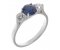Kiss style round blue sapphire and round brilliant cut diamond trilogy ring