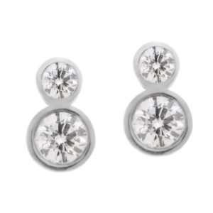 rubover style classic drop earrings round brilliant cut diamond smaller diamond set above platinum gold