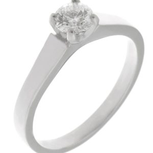 modern claw set round brilliant cut diamond solitaire engagement ring with flat shoulders Platinum gold