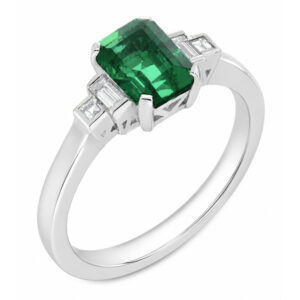 Classic art deco style modern ring emerald cut centre stone stepped graduated baguette cut diamond shoulders setting platinum gold