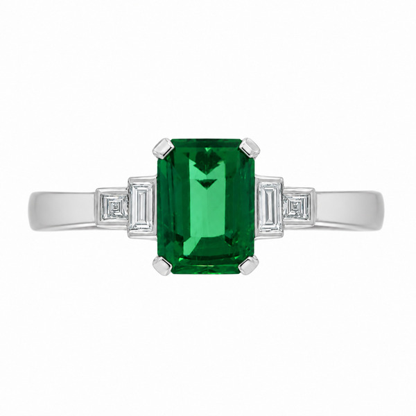 Classic art deco style modern ring emerald cut centre stone stepped graduated baguette cut diamond shoulders setting platinum gold