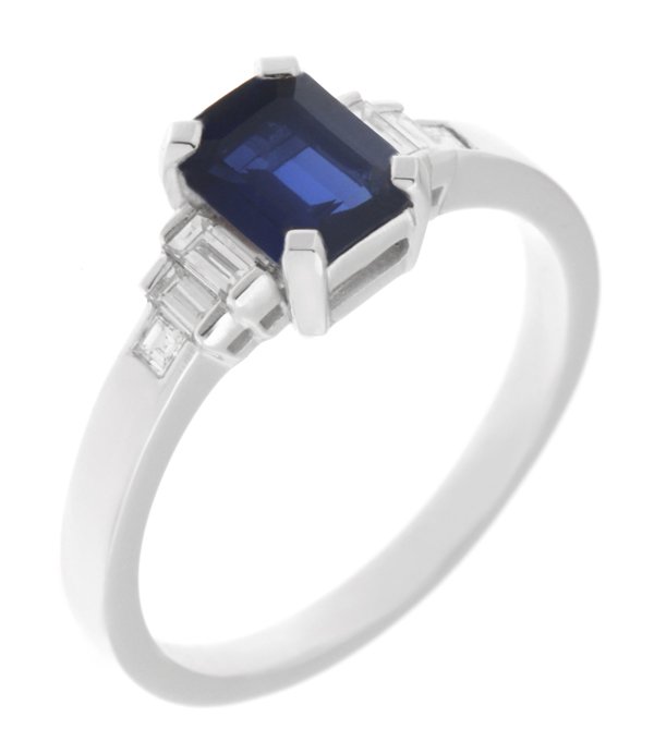 1920's Art Deco style ring octagon shaped emerald cut blue sapphire main stone baguette cut diamonds shoulders platinum gold
