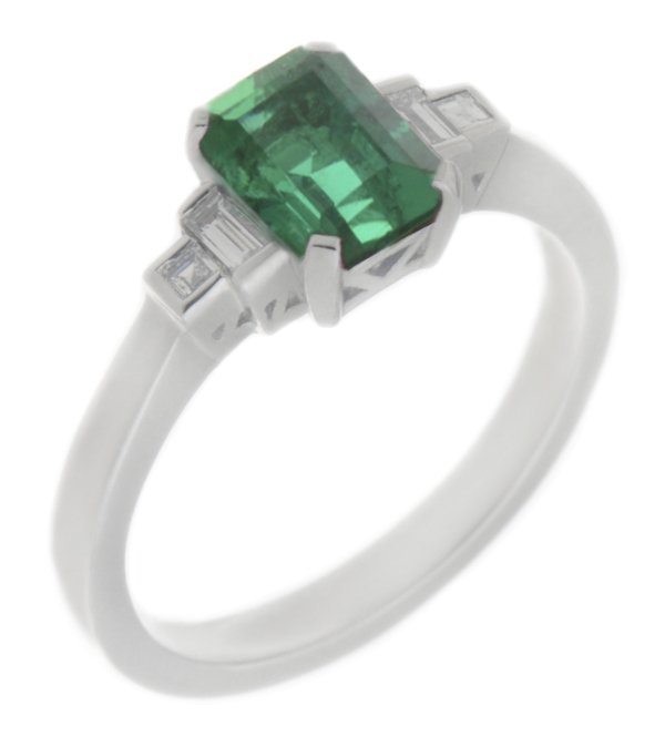 Classic art deco style modern ring emerald cut centre stone stepped graduated baguette cut diamond shoulders setting platinum gold