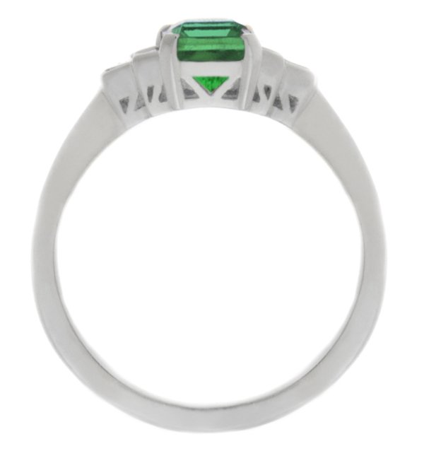 Classic art deco style modern ring emerald cut centre stone stepped graduated baguette cut diamond shoulders setting platinum gold