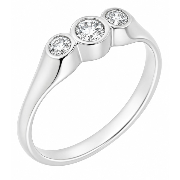 A round brilliant cut diamond trilogy ring in a raised rubover gypsy style setting platinum gold