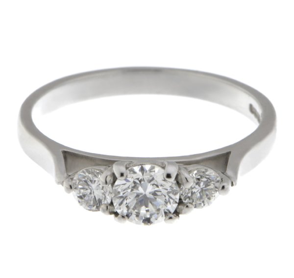 trilogy ring round brilliant cut diamond platinum gold three claw
