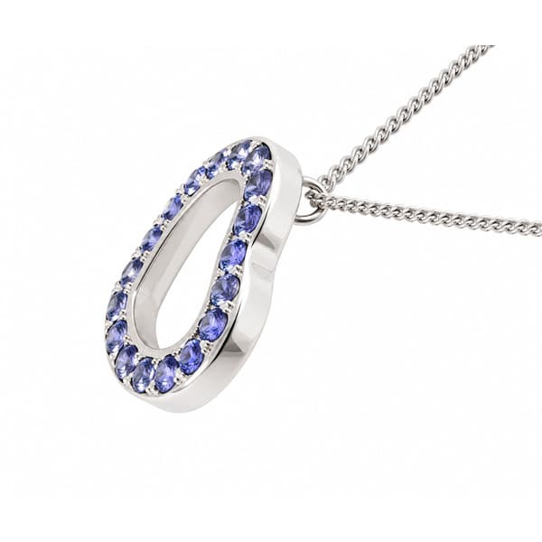 A heart shaped pendant with grain set round Tanzanite. designed to sit at an angle designer modern pendant gold platinum chain