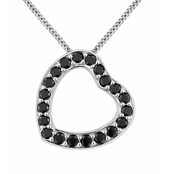 A heart shaped pendant with grain set round black diamonds. designed to sit at an angle designer modern pendant gold platinum