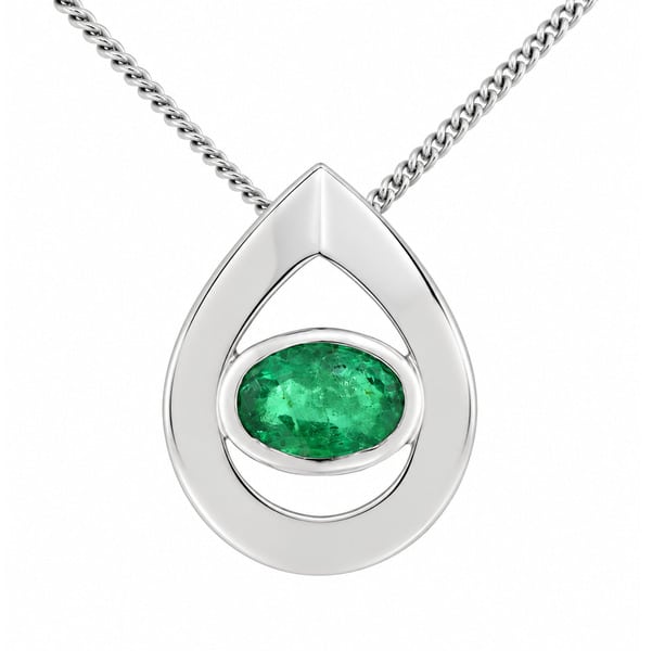 A modernist pear shape tear drop pendant with an oval emerald centre stone in rubover setting. designer modern gold platinum chain