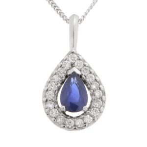 A classic pear shape cut blue sapphire drop pendant with a halo of round brilliant cut diamonds & single bail loop gold platinum chain