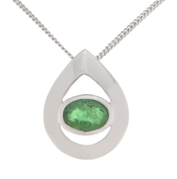 A modernist pear shape tear drop pendant with an oval emerald centre stone in rubover setting. designer modern gold platinum chain