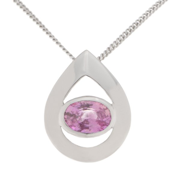 A modernist pear shape tear drop pendant with an oval pink sapphire centre stone in rubover setting. designer modern gold platinum chain