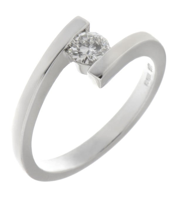 modern crossover style solitaire round brilliant cut diamond engagement dress ring modernist contemporary platinum gold