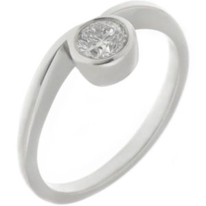 contemporary ribbon style crossover engagement ring set with a round brilliant cut solitaire diamond platinum gold