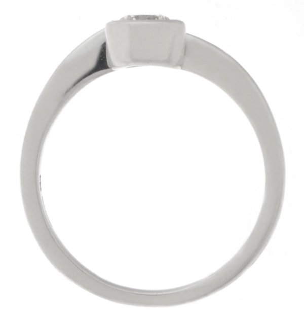 contemporary ribbon style crossover engagement ring set with a round brilliant cut solitaire diamond platinum gold