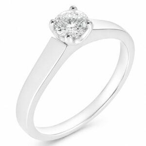 modern claw set round brilliant cut diamond solitaire engagement ring flat shoulders Platinum gold