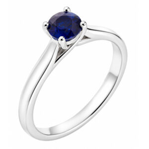 round blue sapphire classic solitaire engagement ring kiss style crossover setting modern contemporary platinum gold 4 claw