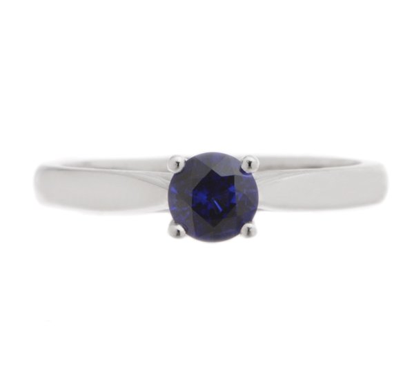 round blue sapphire classic solitaire engagement ring kiss style crossover setting modern contemporary platinum gold 4 claw