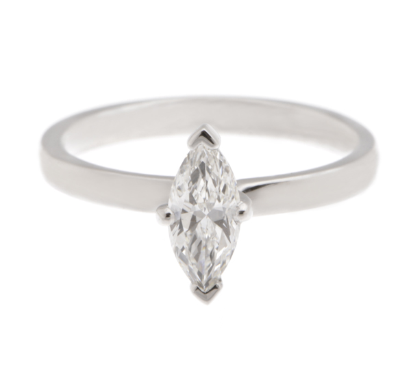 A modern 4 four claw classic solitaire twist compass set style marquise shape cut diamond engagement ring lab grown platinum gold