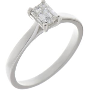 A modern 4 four claw classic solitaire kiss style octagon Emerald step cut diamond engagement ring lab grown platinum gold
