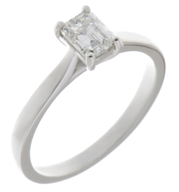 A modern 4 four claw classic solitaire kiss style octagon Emerald step cut diamond engagement ring lab grown platinum gold