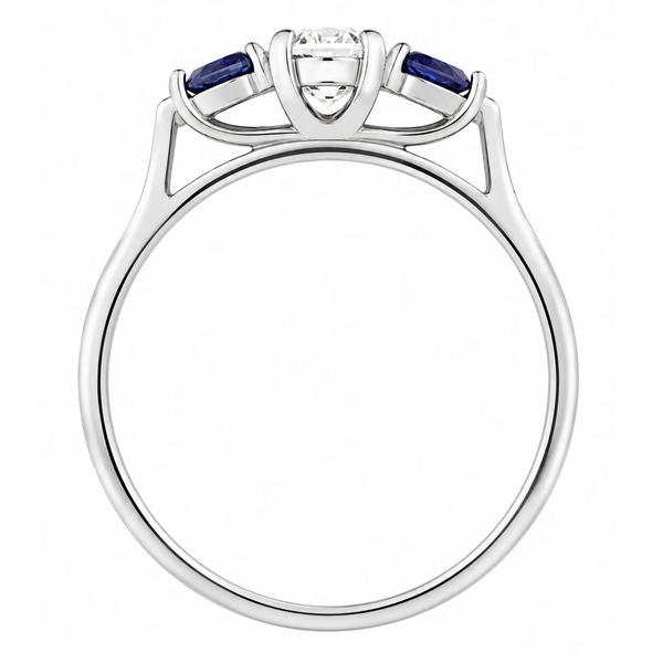 modern classic round brilliant cut diamond trilogy ring with round blue sapphire accent side stones platinum gold three claw set
